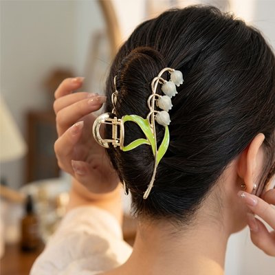 Pince à cheveux blanc élégante